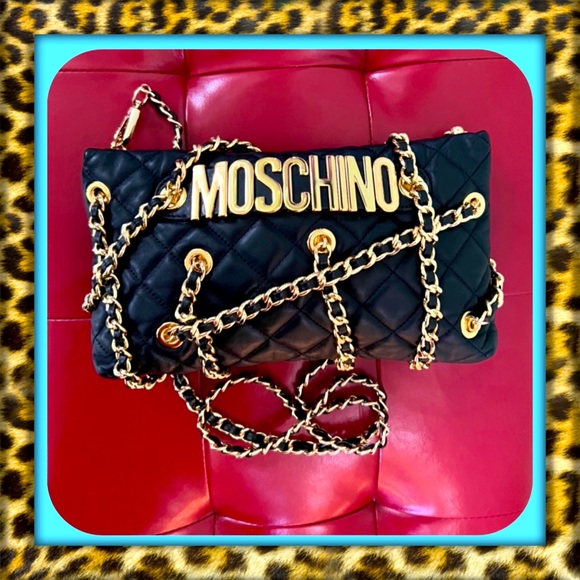 Moschino Handbags - 👑✅PRICE FIRM✅NO OFFERS SUPER SALE!! 👑AUTHENTIC Moschino Leather Clutch Bag